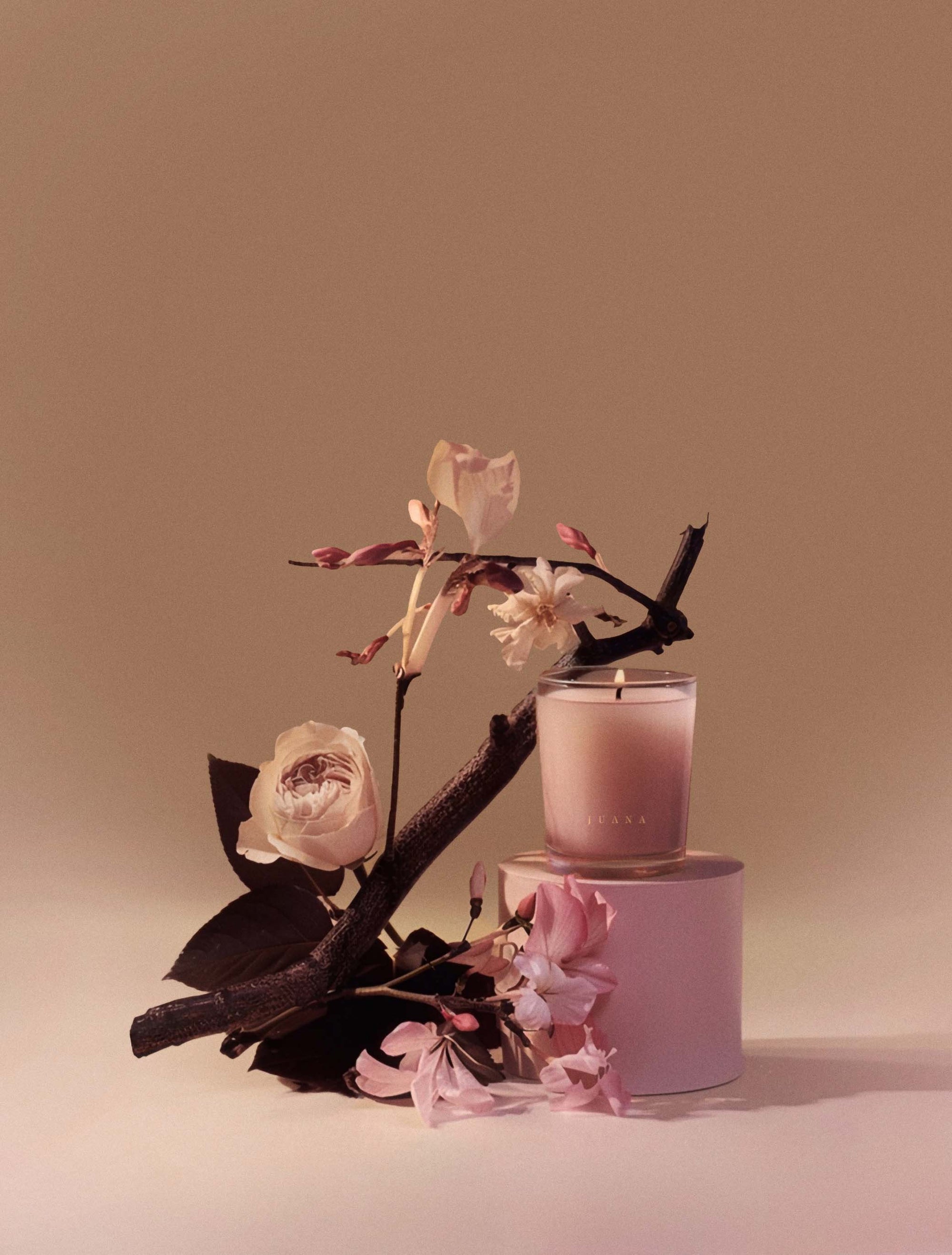 Juana Rose+Jasmine Romance Arouse apothecary candle with ikebana-inspired botanical arrangement, vegan coco-apricot wax, eco-friendly.