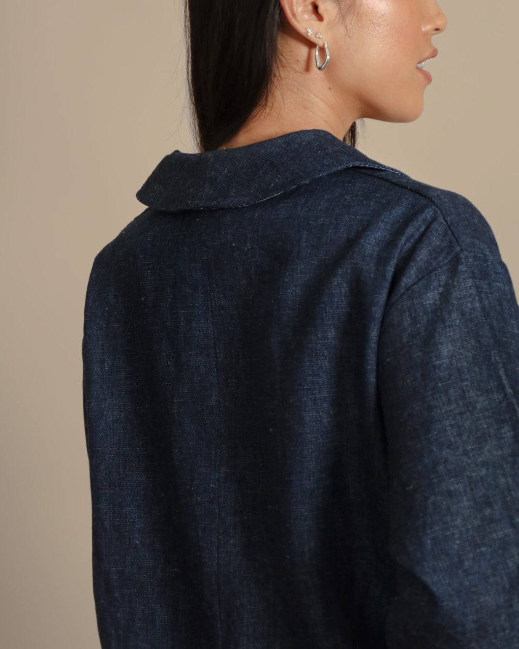 Back details of Juana Denim Atelier Trench Coat showing detailing and stitching craftsmanship.
