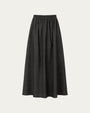 Hemp Blend Maxi Skirt (black) on ghost mannequin, front view highlighting clean waistband and pleats.