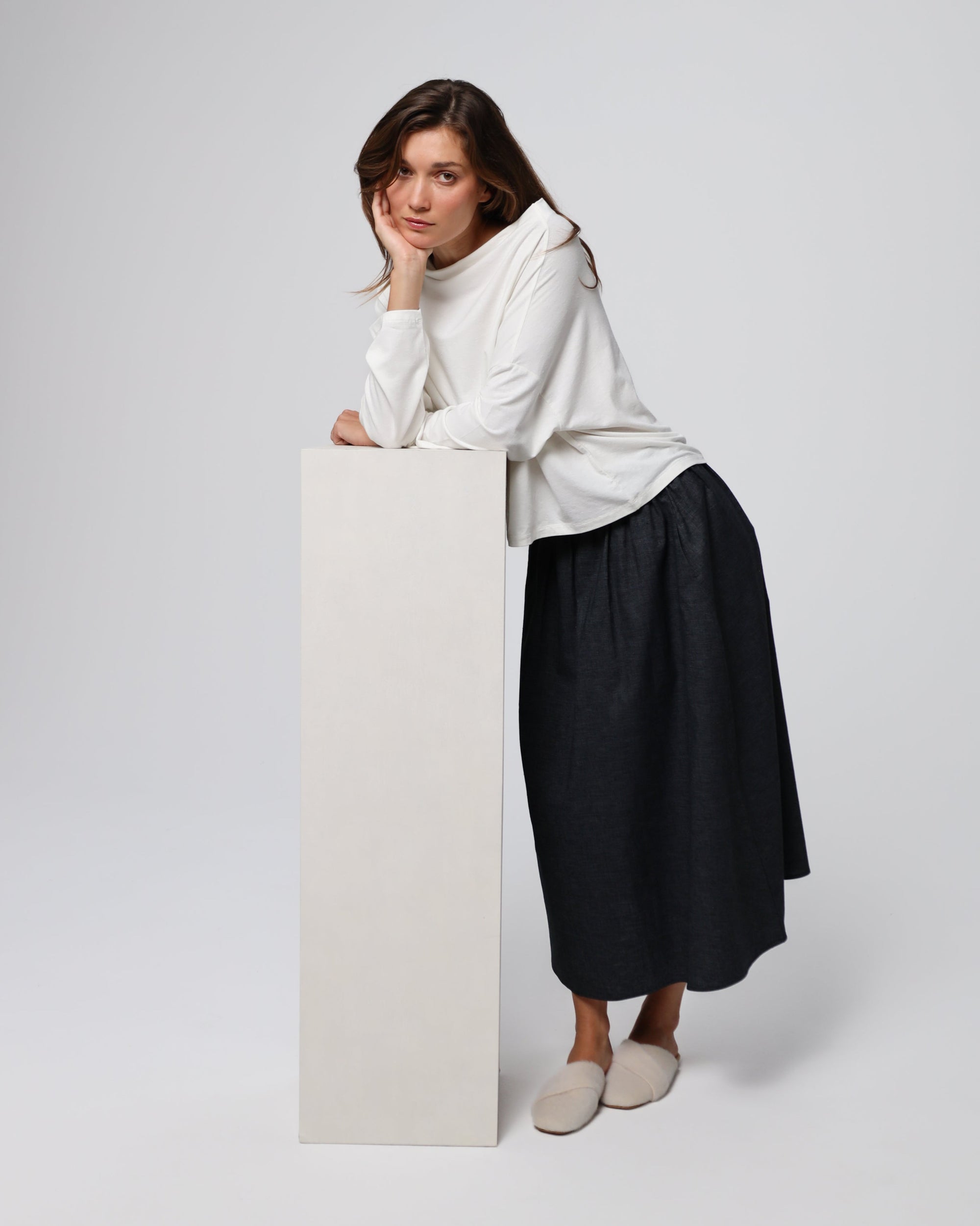Model pairing Hemp Blend Maxi Skirt (black) with a lightweight knit for modern, minimalist polish.