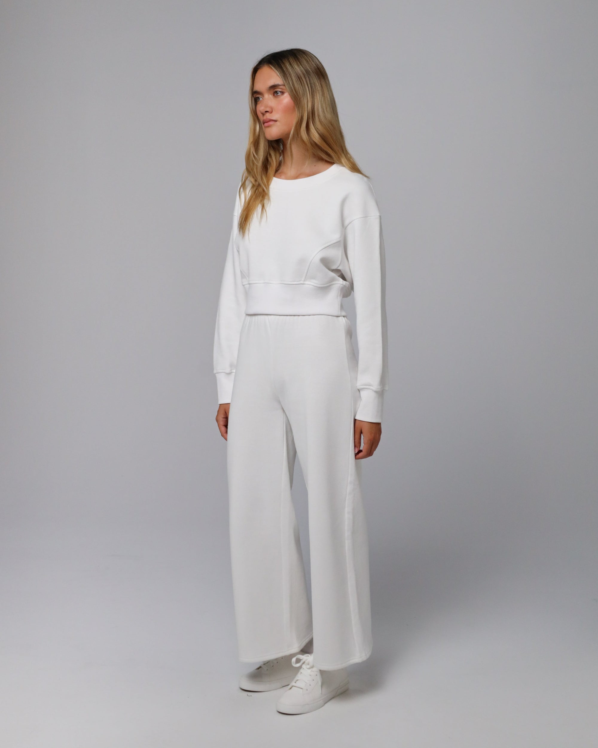 Full-body view of Fleece Cropped Sweater  and Hemp Essentials Fleece Sweatpants (white) styled head-to-toe.