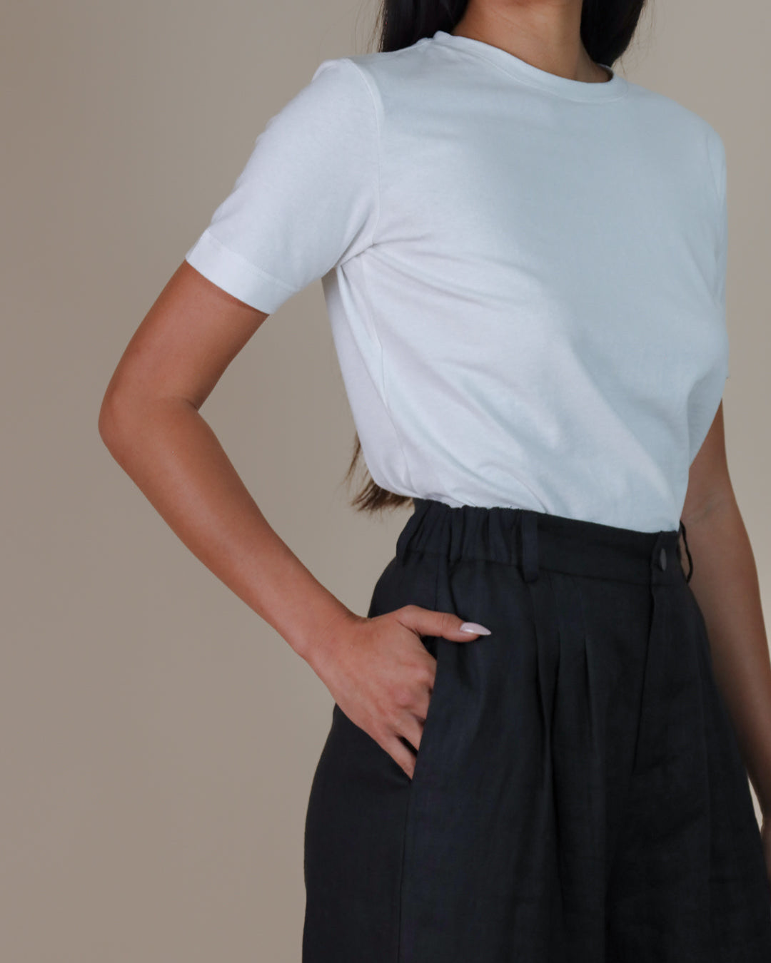 Details of Juana Hemp High Rise Pants, showing texture and corozo button details.
