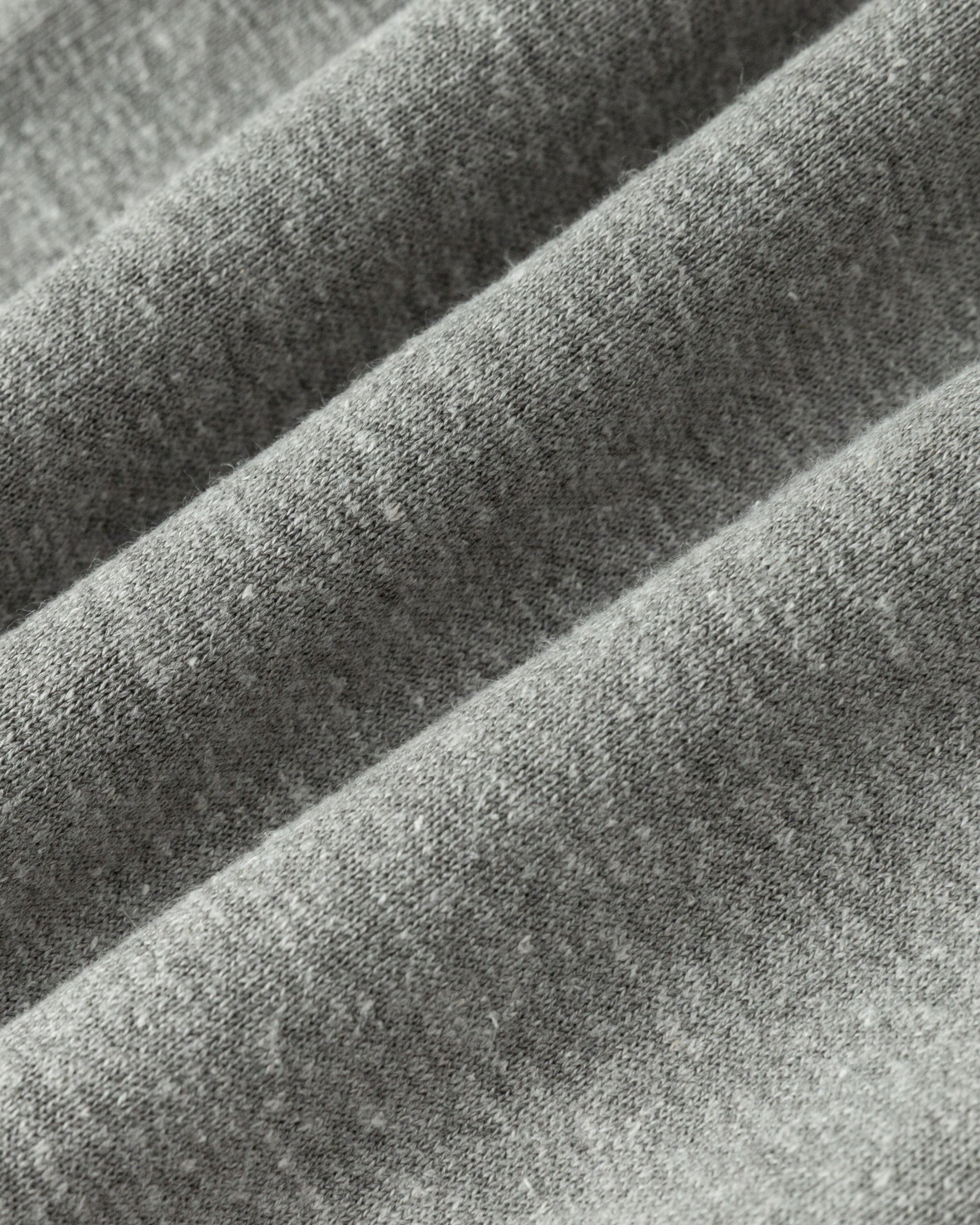 Close-up of hemp–Tencel™–organic cotton–spandex knit of Off Hours Mid Rise Joggers (grey), highlighting breathable texture.