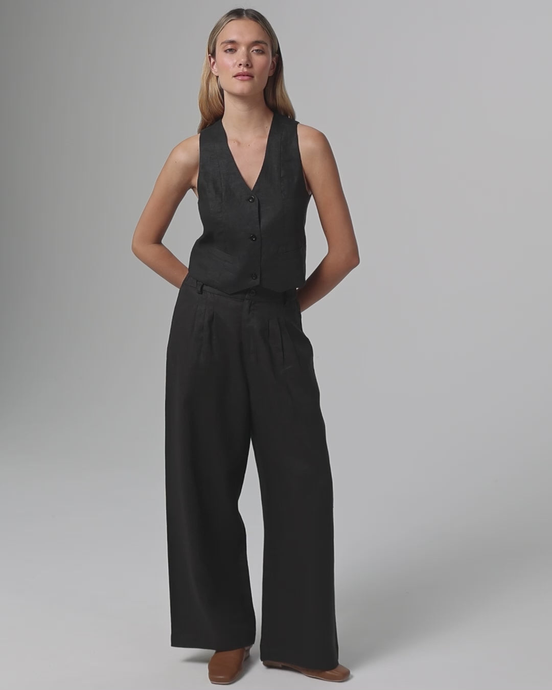 360-degree video of model wearing Juana Hemp Tailored Vest and High Rise Pants (natural), showing fit, drape, and movement.