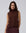 Juana Wool Cashmere Sweater Vest in Chocolate (wool–cashmere) styled over a lightweight shirt with the shell side straps visible.