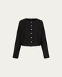 Juana Aella Long Sleeve Woven Top (black) on ghost mannequin, front view highlighting neckline, placket, and relaxed fit.