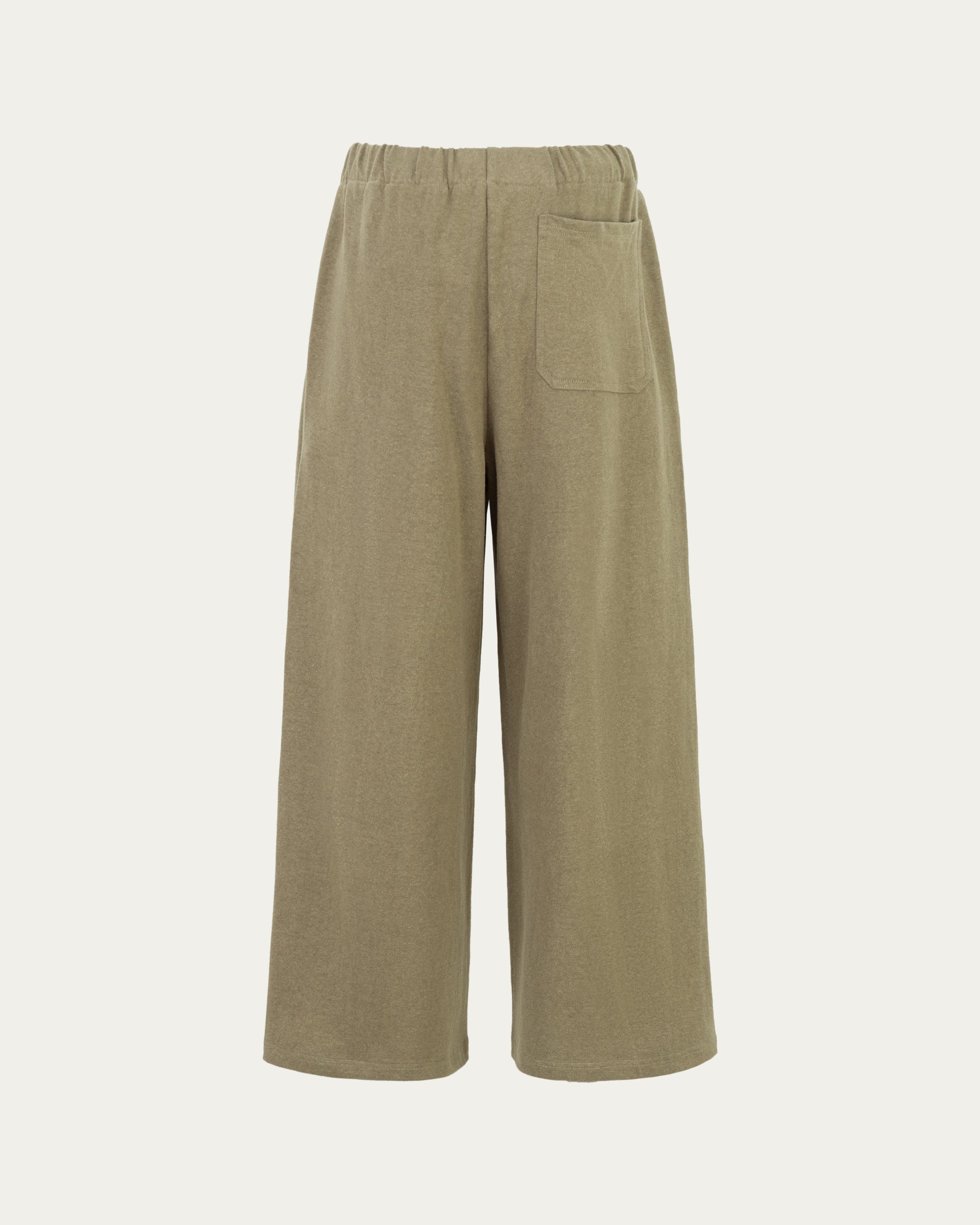 Ghost back of Juana Aera Pull-on Pants in olive (hemp–organic cotton blend), showing relaxed drape and clean back finish.