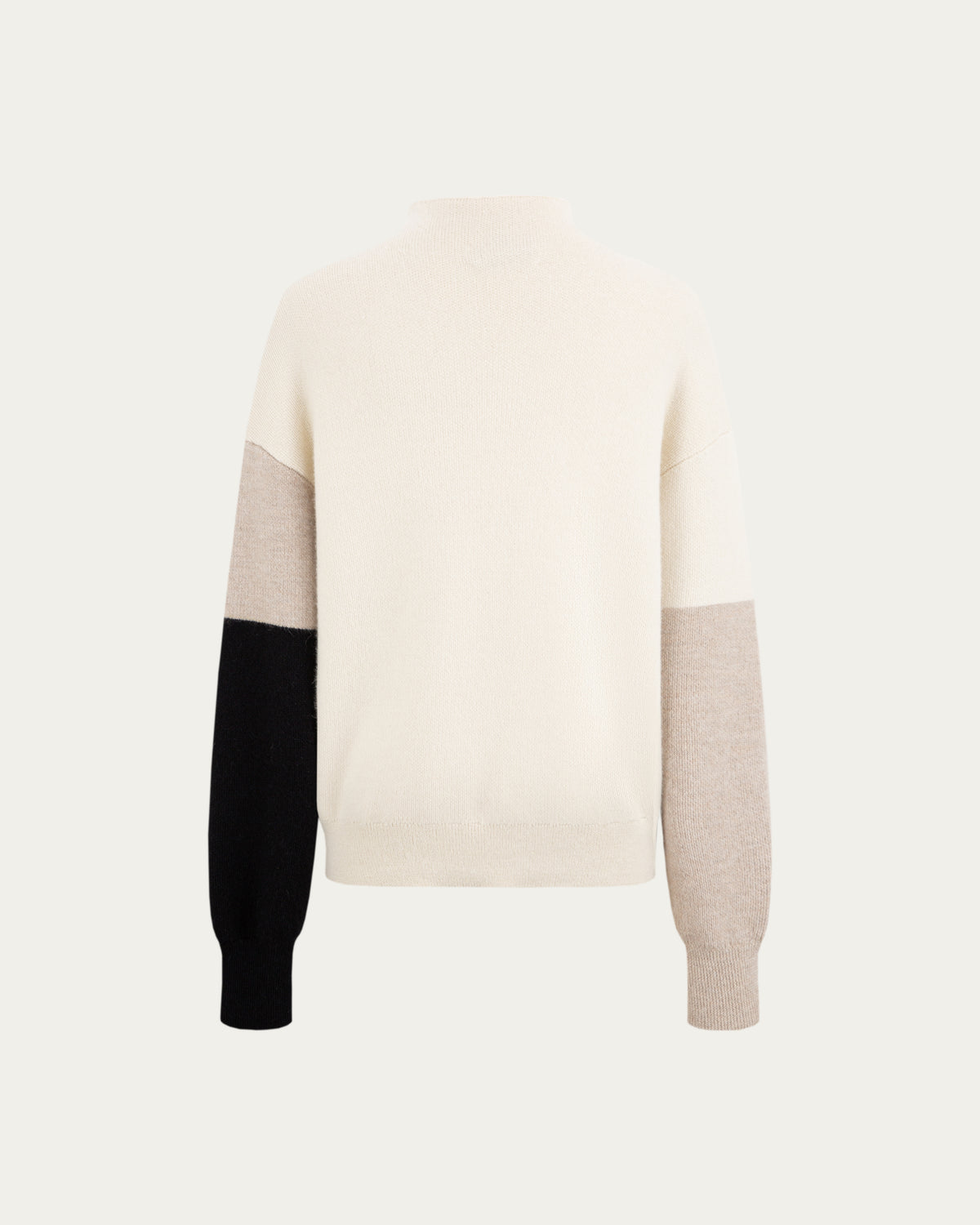 Juana Alpaca Crewneck Sweater in Cream/Black (baby alpaca wool–knit) shown from the back with a subtle high-low hem.