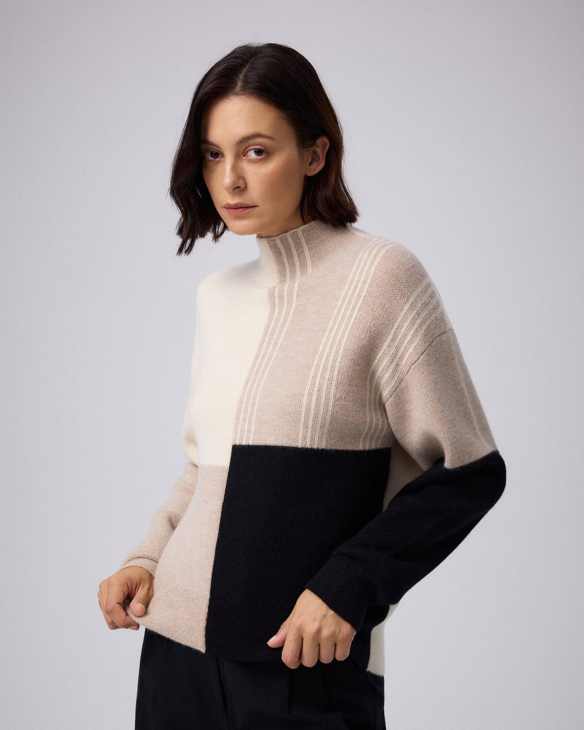 Juana Alpaca Crewneck Sweater in Cream/Black (baby alpaca wool–knit) worn with a true-to-size crewneck silhouette.