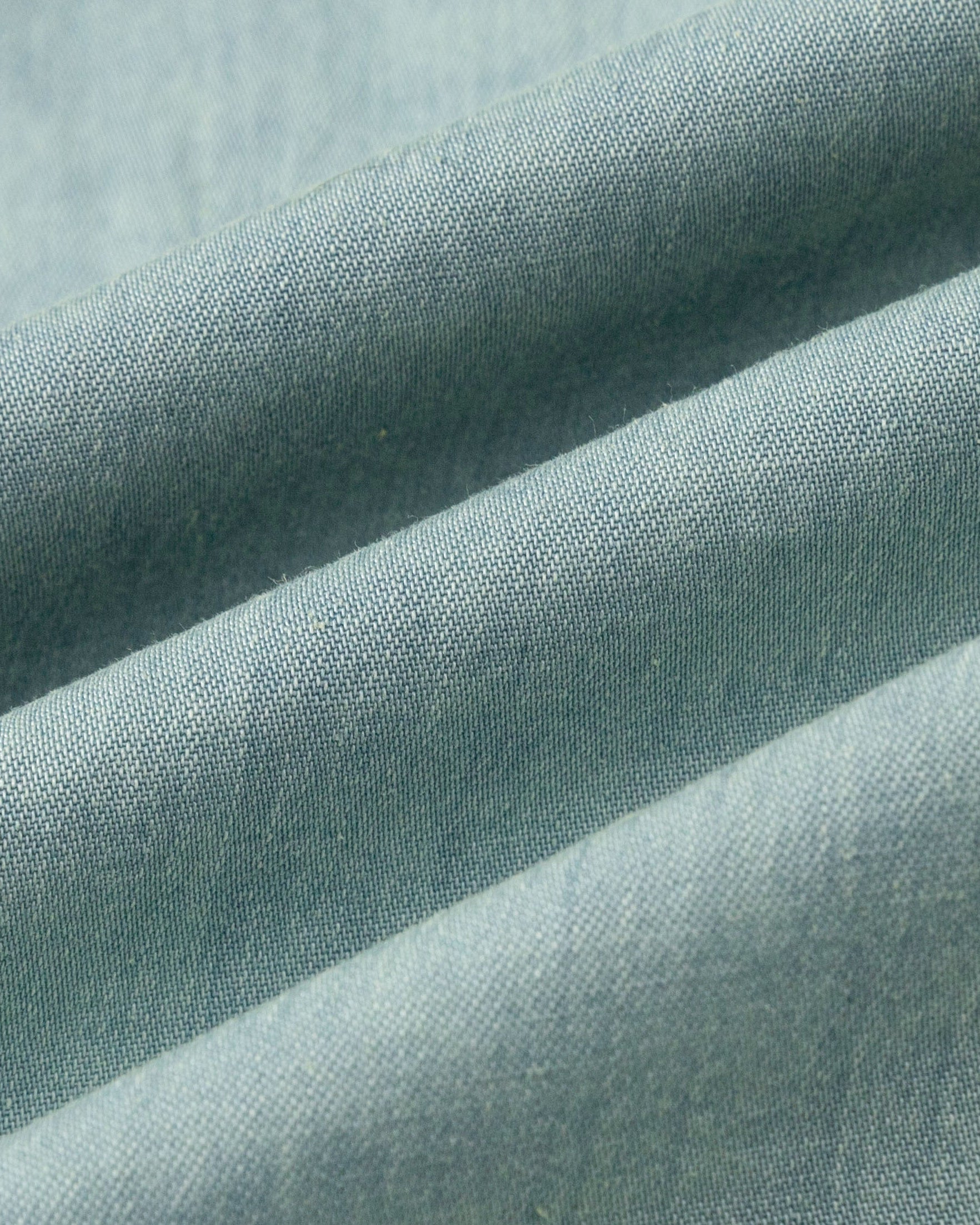 Juana Amaia Pleated Maxi Skirt Chambray blue (sustainable tencel–cotton–hemp) textile swatch showing subtle twill weave