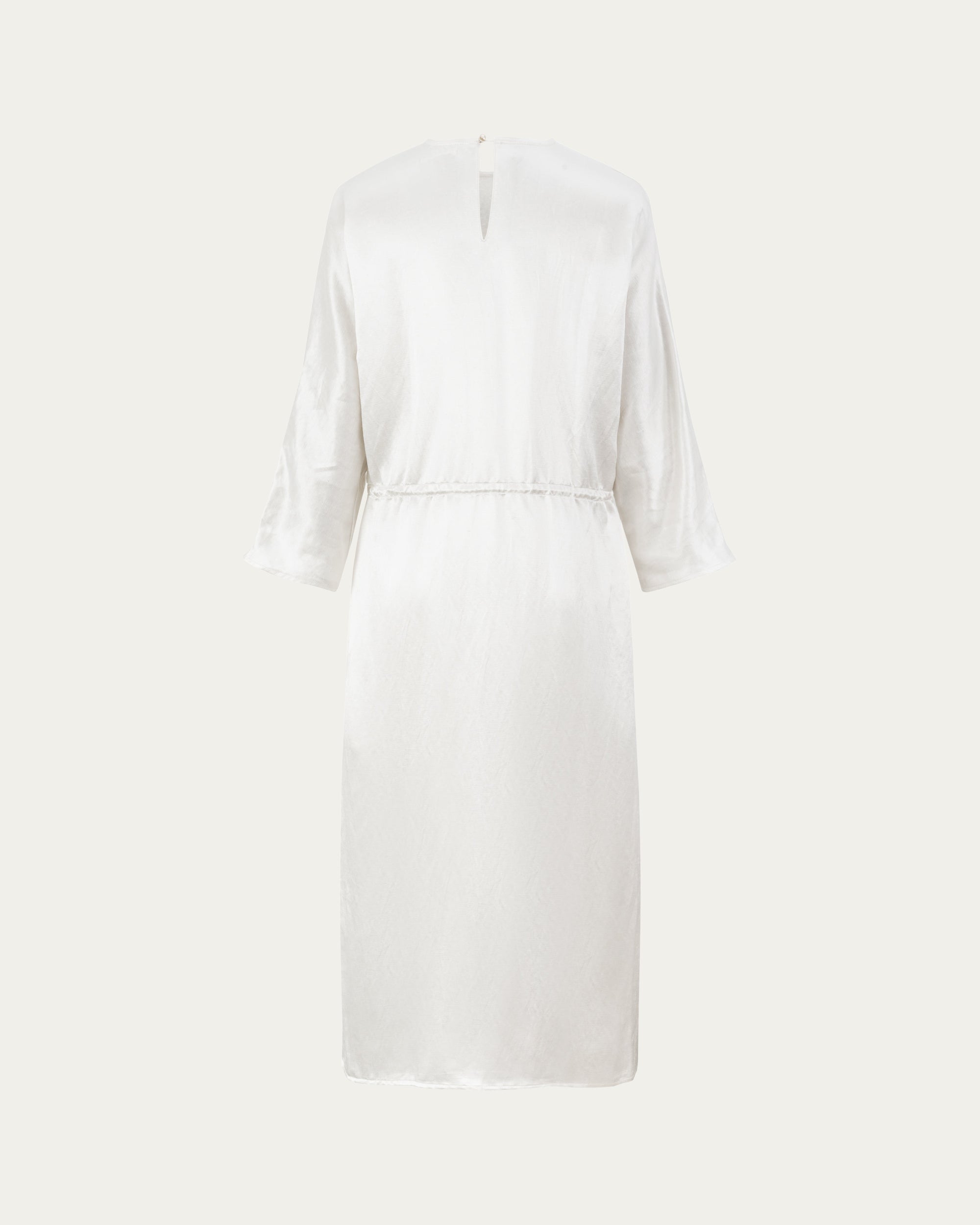 Aven 3/4 Sleeve Raglan Dress (pearl white) on ghost mannequin, back view showing smooth drape and seam placement.