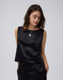 Juana Aven Silk Tank in Black (hemp–silk) with a close view of the boat neckline and smooth fabric finish
