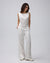 Juana Aven Silk Tank in Pearl White (hemp–silk) styled in a complete look with its clean sleeveless silhouette visible
