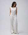 Juana Aven Silk Tank in Pearl White (hemp–silk) styled in a complete look with its clean sleeveless silhouette visible