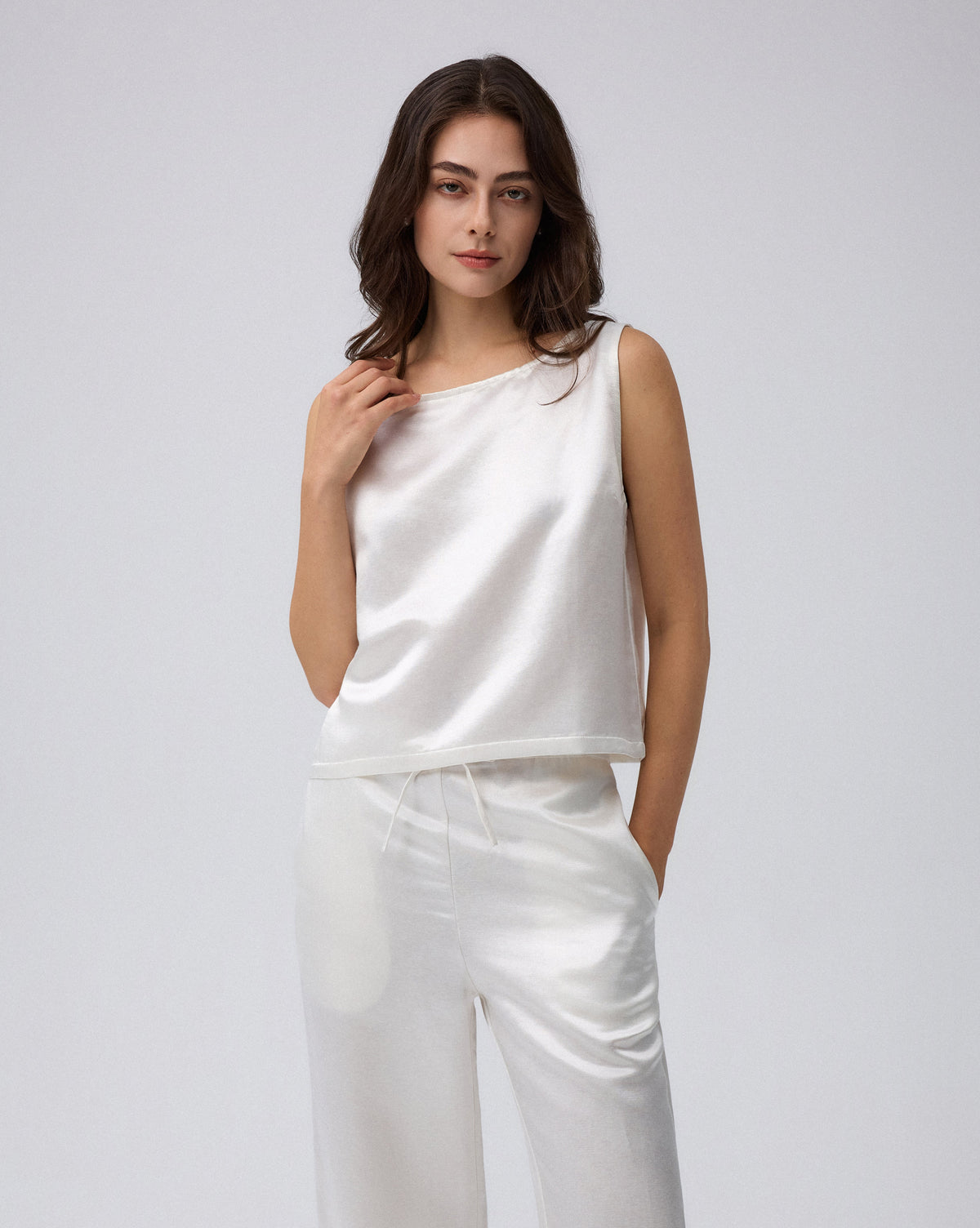 Juana Aven Silk Tank in Pearl White (hemp–silk) styled as a lightweight layering piece with a refined shell silhouette