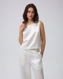 Juana Aven Silk Tank in Pearl White (hemp–silk) styled as a lightweight layering piece with a refined shell silhouette