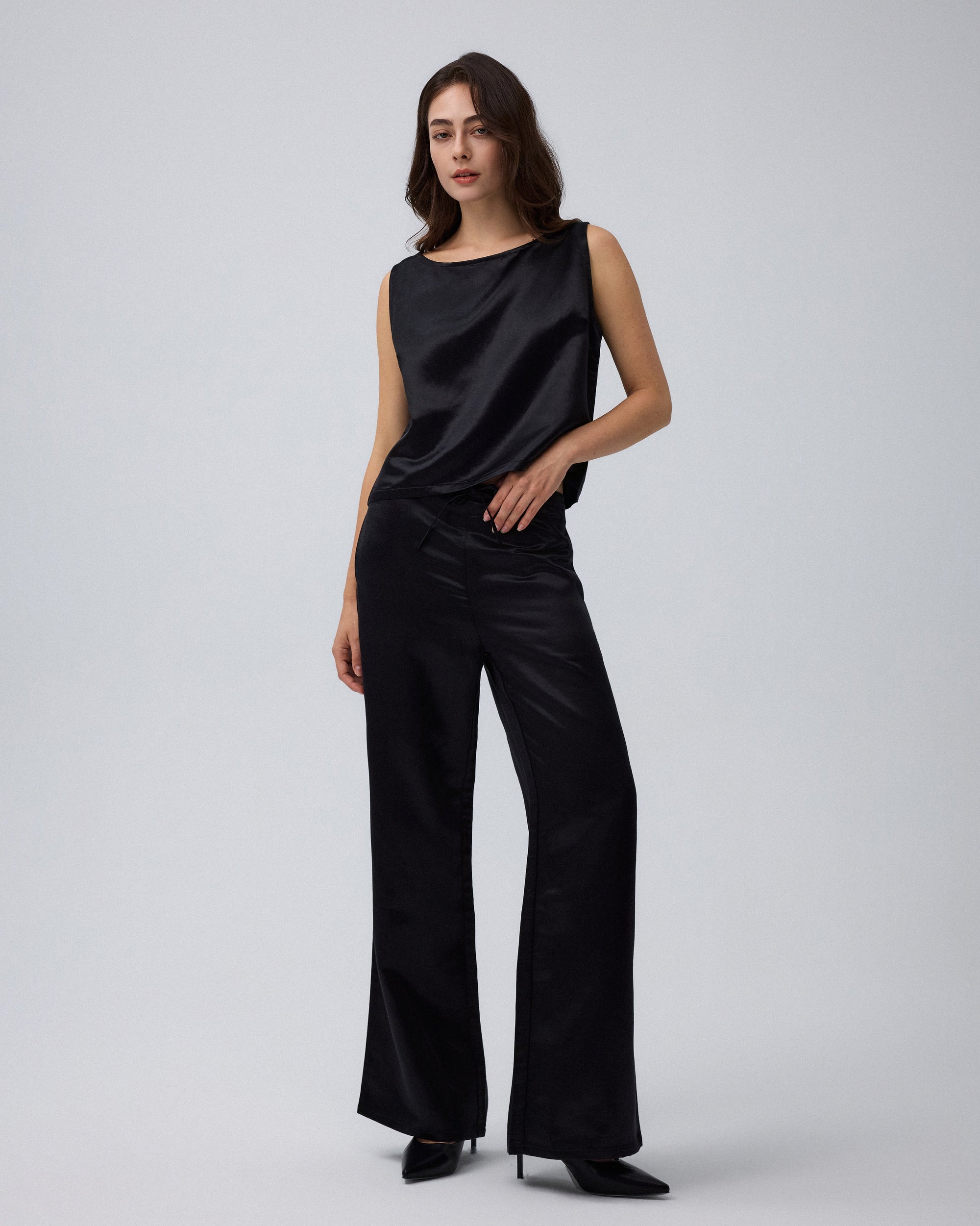 Juana Aven Wide Leg Pants in Black (hemp–silk) modeled from the front to show the high-rise wide-leg fit.
