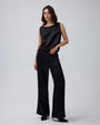 Juana Aven Wide Leg Pants in Black (hemp–silk) modeled from the front to show the high-rise wide-leg fit.
