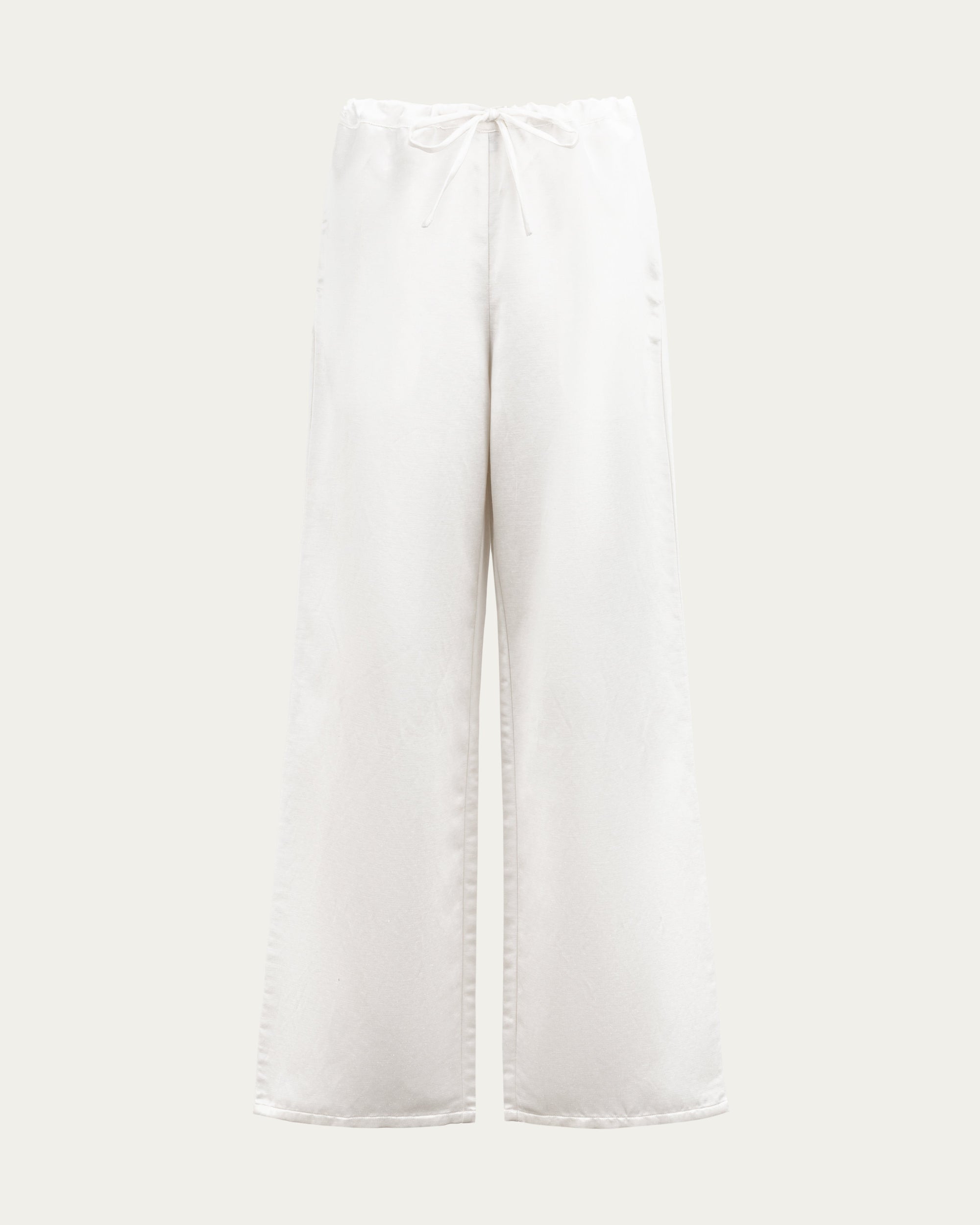 Juana Aven Wide Leg Pants in Pearl White (hemp–silk) shown from the front with a high-rise waist and wide-leg cut.