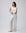Juana Aven Wide Leg Pants in Pearl White (hemp–silk) modeled from the front to show the high-rise wide-leg fit.