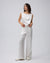Juana Aven Wide Leg Pants in Pearl White (hemp–silk) modeled from the front to show the high-rise wide-leg fit.