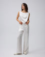Juana Aven Wide Leg Pants in Pearl White (hemp–silk) modeled from the front to show the high-rise wide-leg fit.
