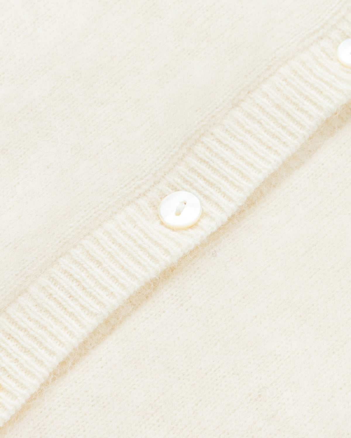 Juana Brushed Wool-Blend Vest in Ivory (wool–cashmere–silk) with natural shell buttons and a brushed front finish