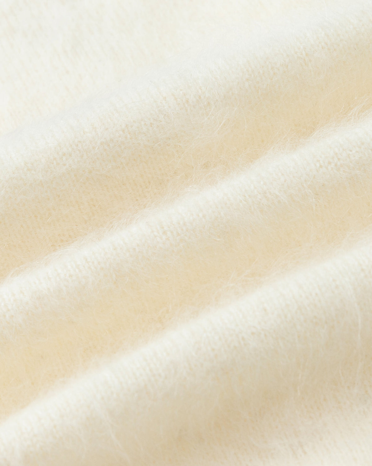 Juana Brushed Wool-Blend Vest in Ivory (wool–cashmere–silk) textile close-up showing the soft brushed texture