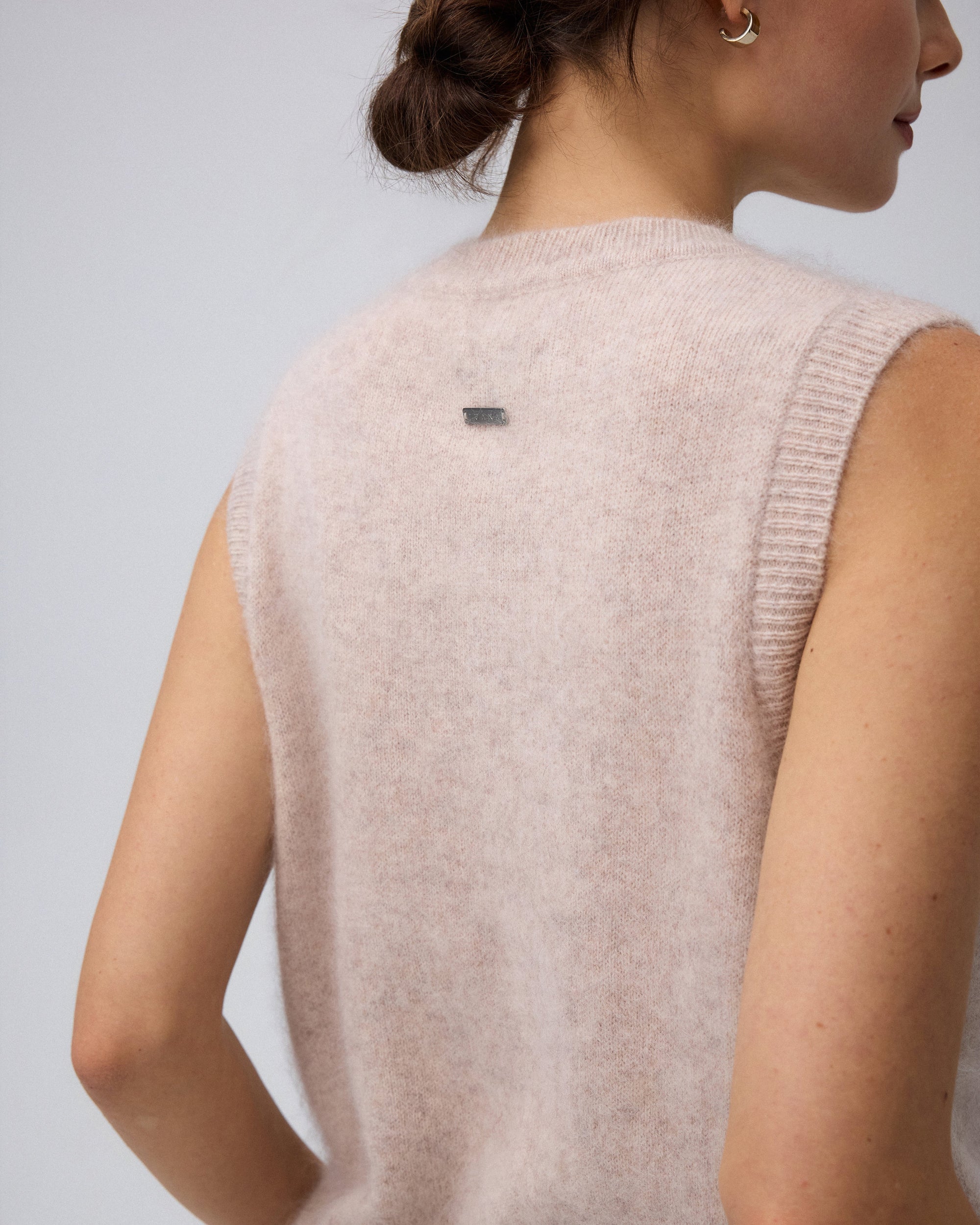 Juana Brushed Wool-Blend Vest in Oatmeal Melange (wool–cashmere–silk) shown from the back with a sleeveless shape
