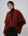 Detail of neckline and edge finish on burgundy wool–cashmere–hemp cape.