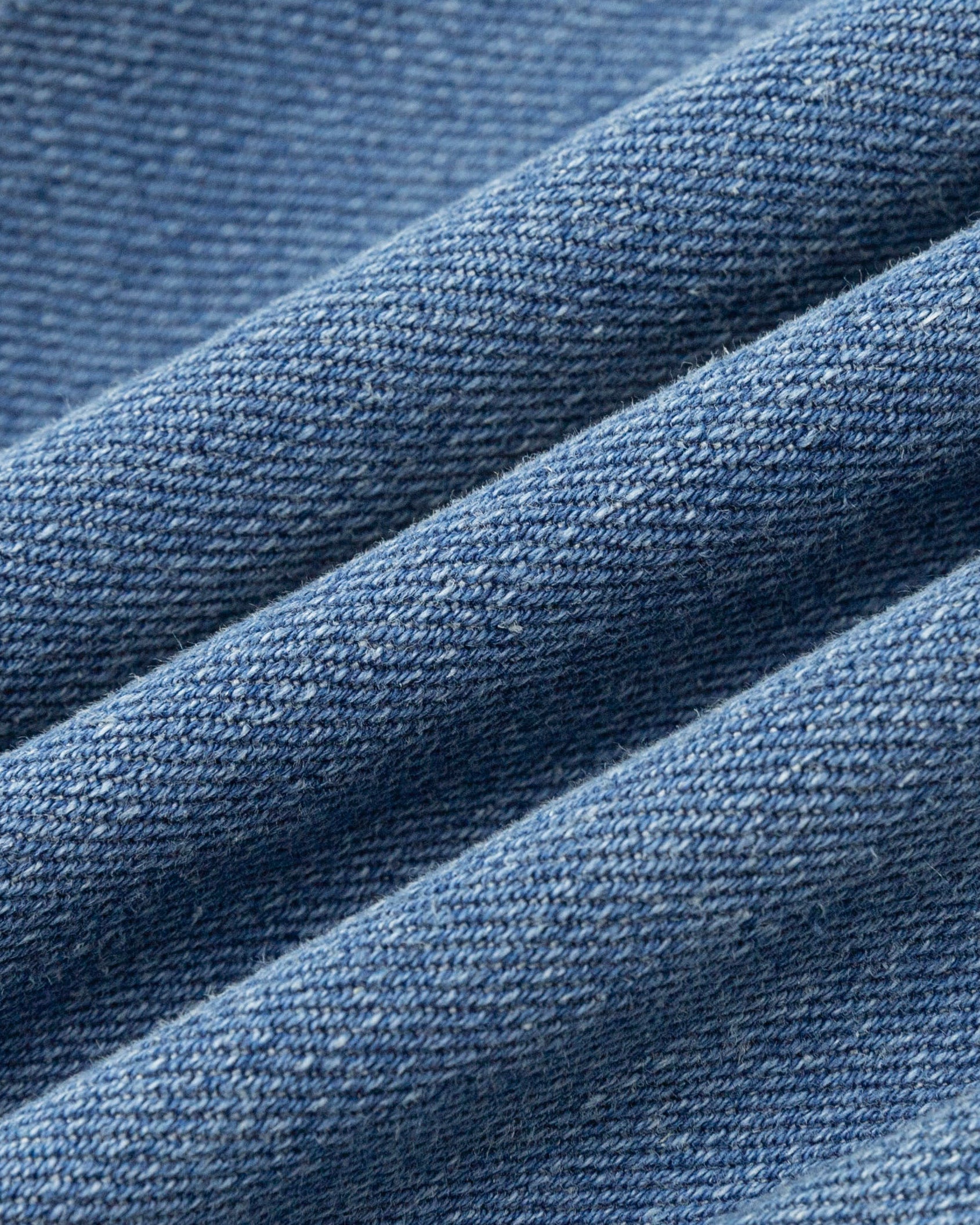 Juana Denim Atelier Crossover Jeans light blue denim (cotton–hemp) textile close-up showing denim texture
