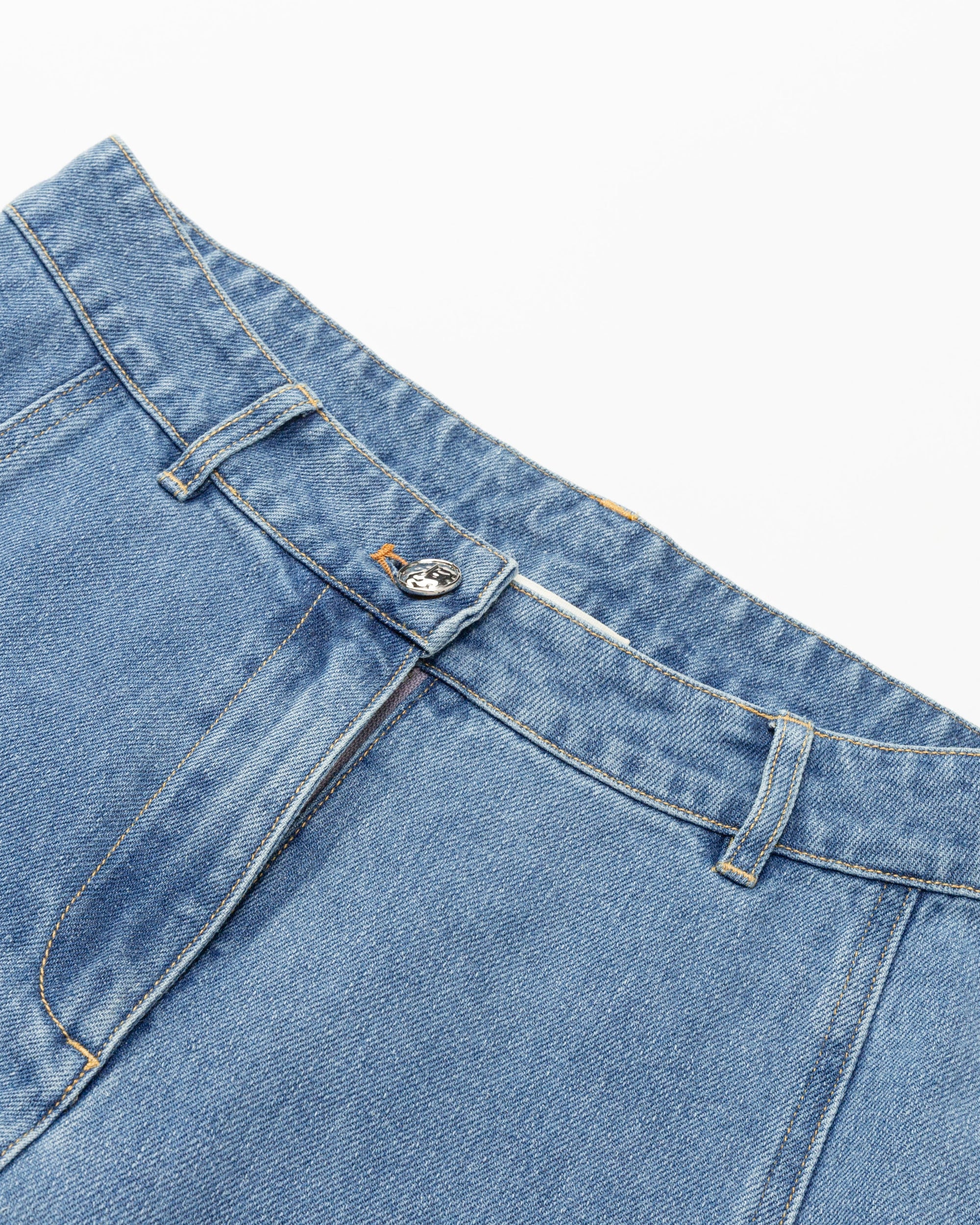 Juana Denim Atelier Flare Jeans light blue denim (cotton–hemp blend) layflat view showing waistband detail