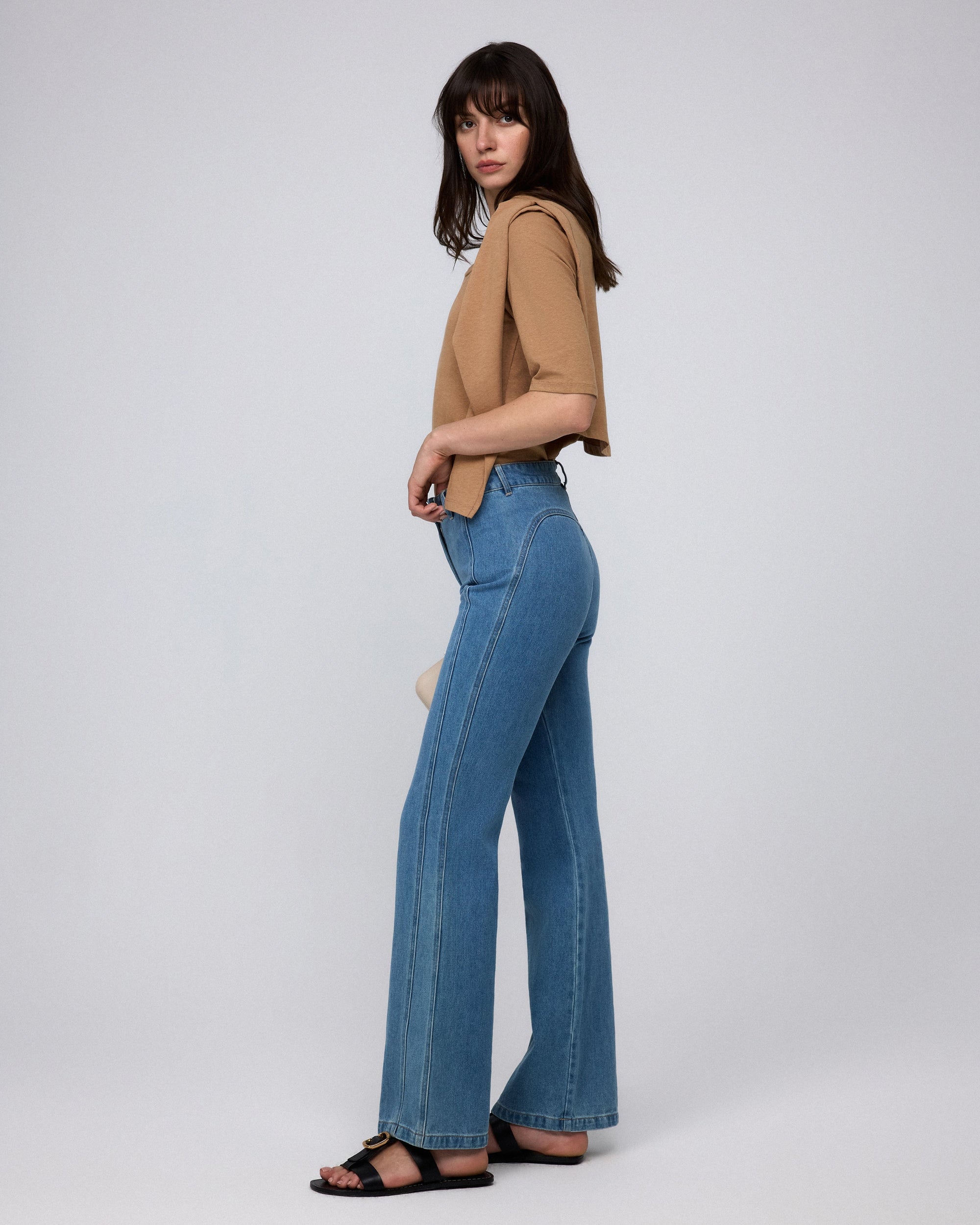 Juana Denim Atelier Flare Jeans light blue denim (cotton–hemp blend) model side view showing subtle flare