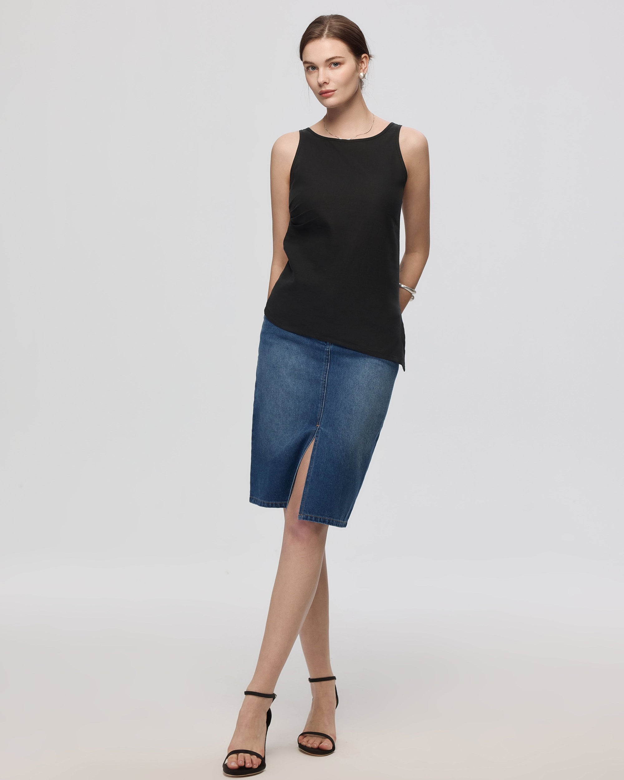 Juana Denim Atelier Midi Skirt Medium Indigo (hemp–cotton) on model showing straight midi silhouette and front slit
