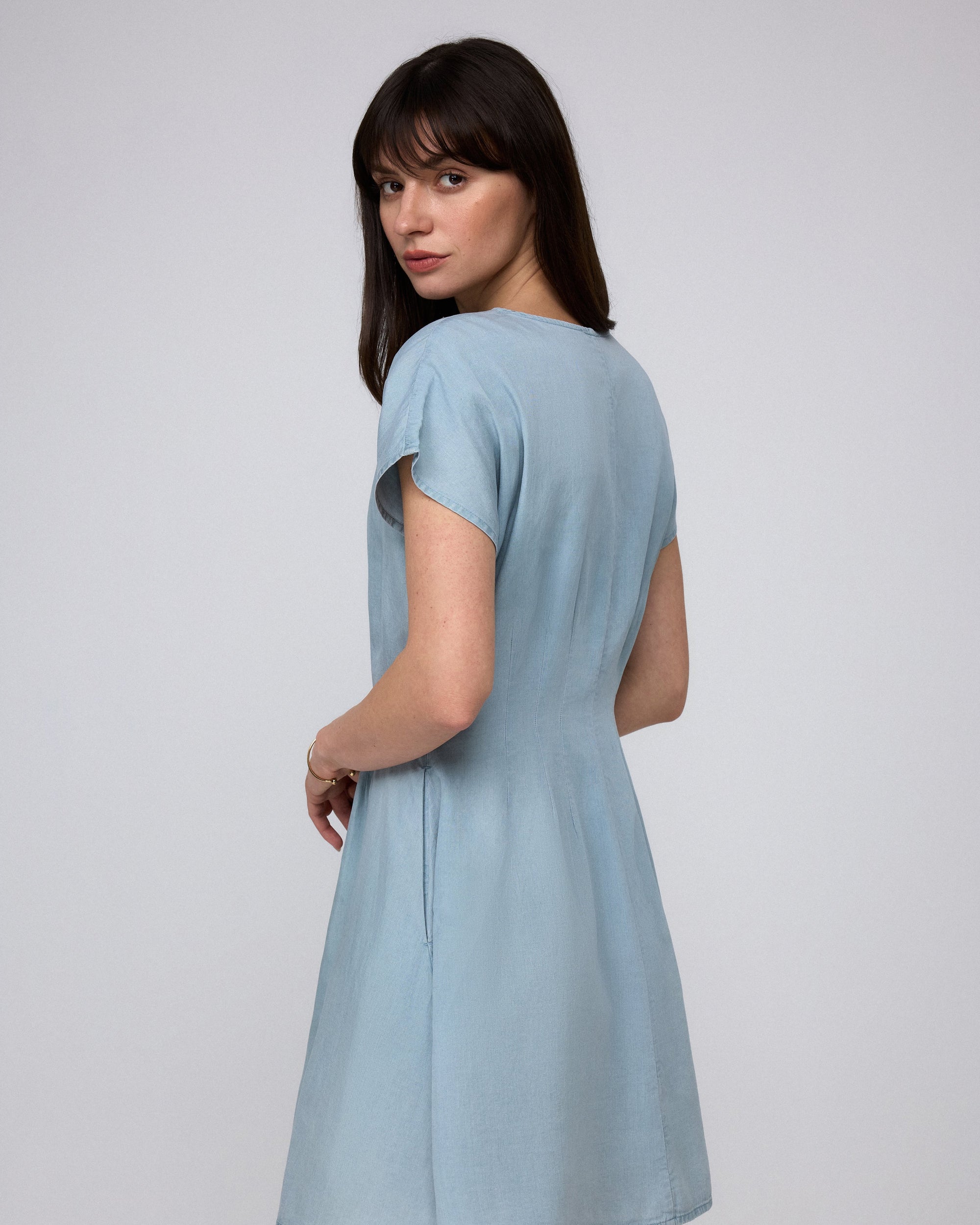 Juana Faye Pleated Shirt Dress chambray blue (Tencel–cotton–hemp blend) back view on model