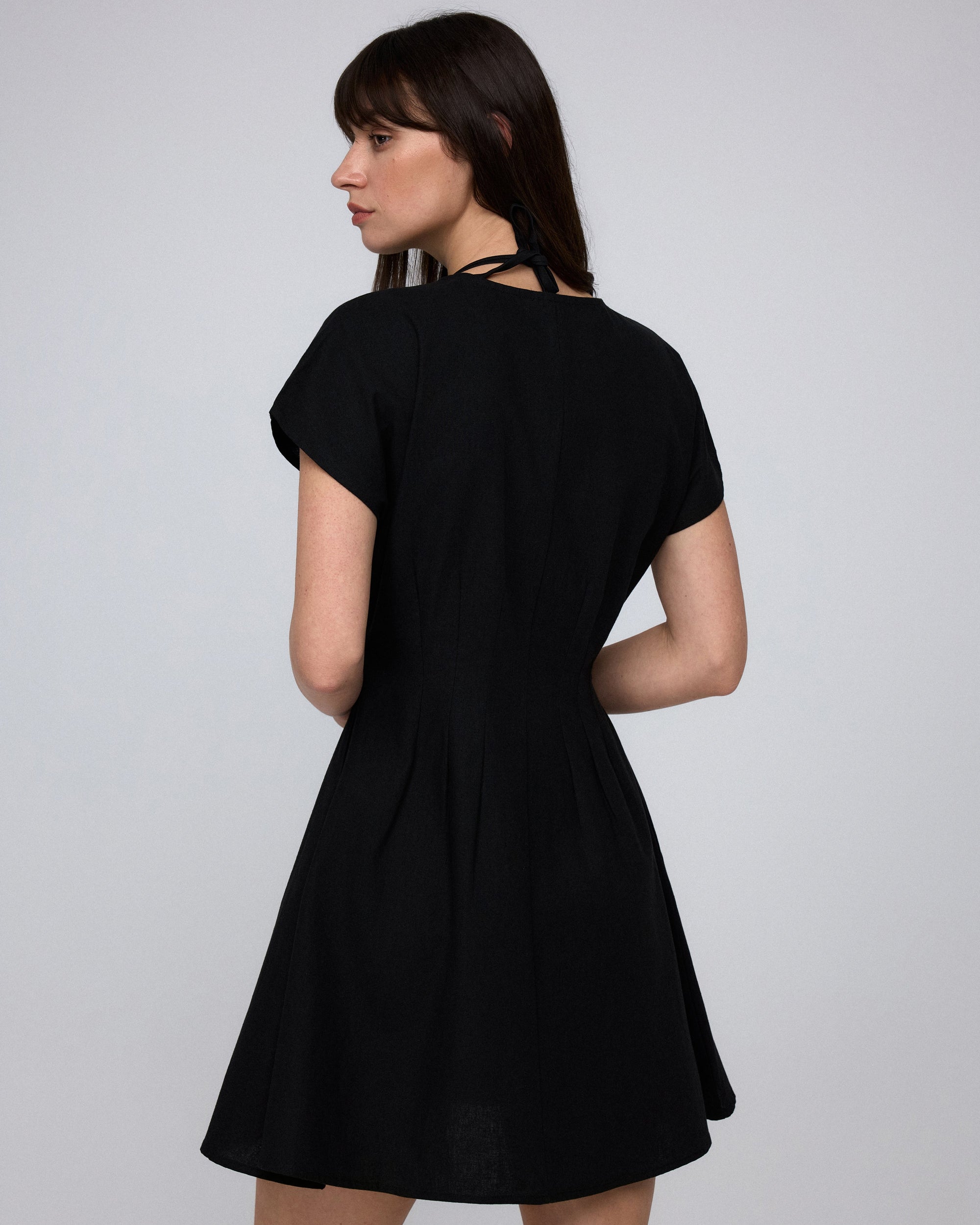Juana Flora Pleated Shirt Dress black (hemp–cotton blend) back view with cap sleeve coverage