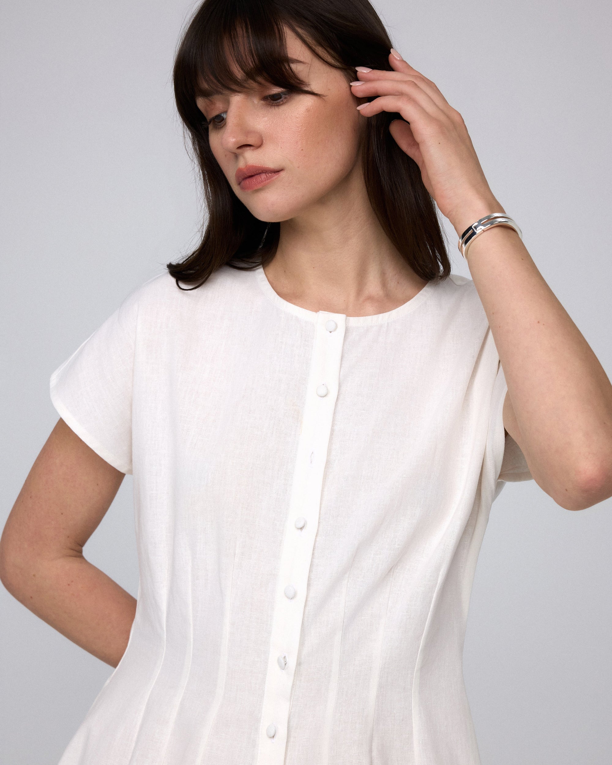 Juana Flora Pleated Shirt Dress white (hemp–cotton blend) detail view of covered buttons and pleats