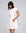 Juana Flora Pleated Shirt Dress white (hemp–cotton blend) model main with pleated silhouette
