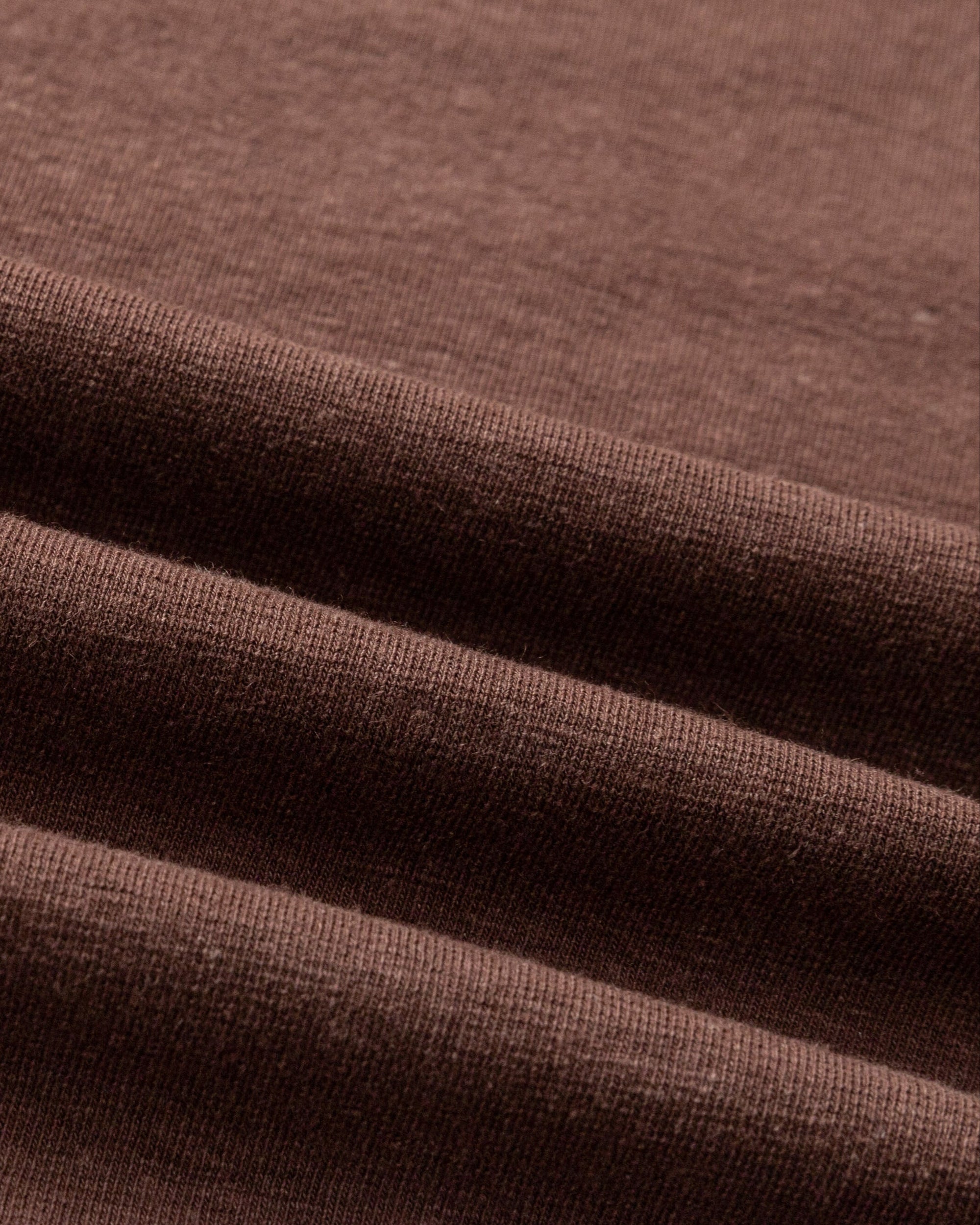 Close-up of hemp–organic cotton stretch knit of Asymmetrical Neckline Tee (cacao), highlighting breathable texture.