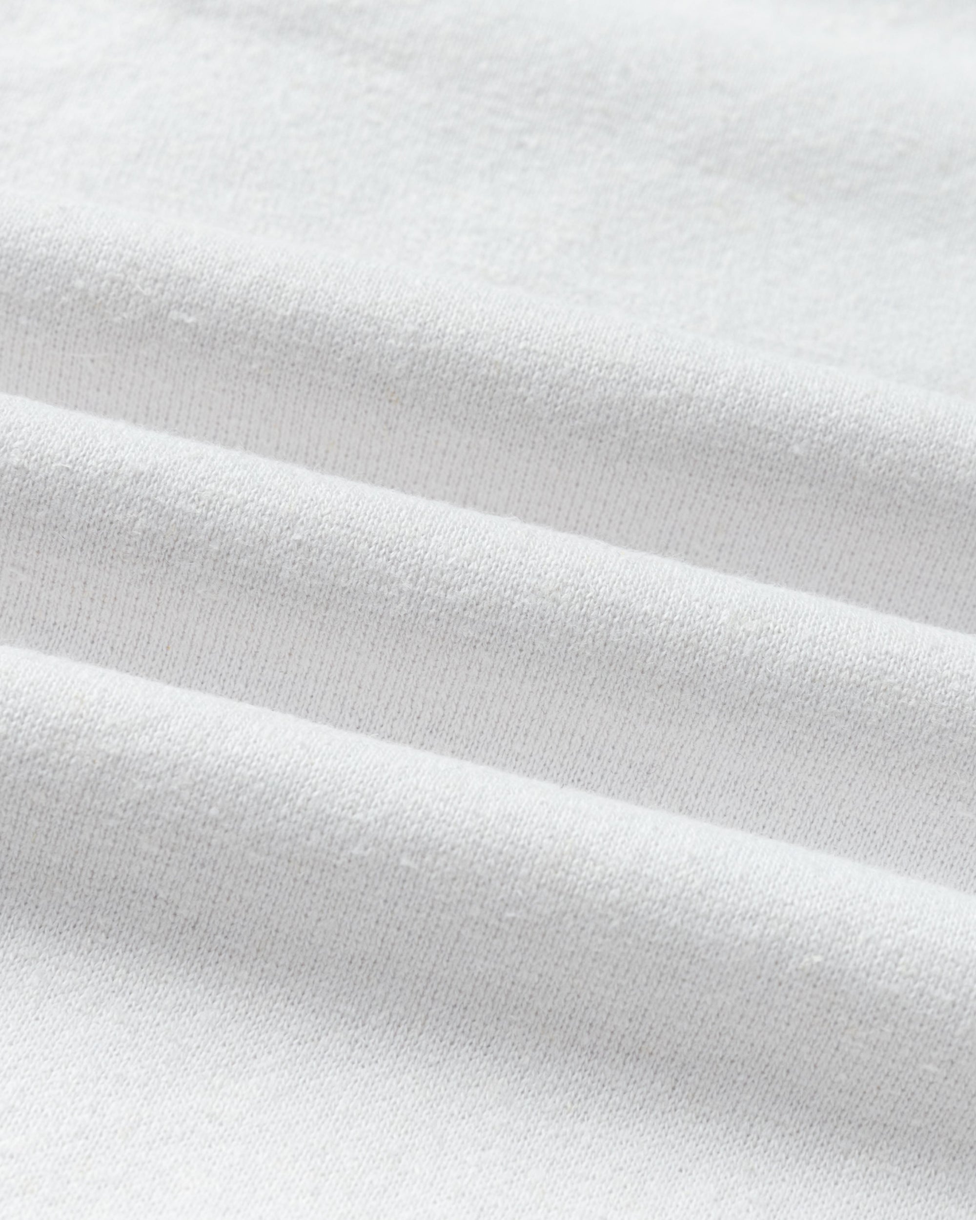 Close-up of hemp–organic cotton fleece knit of Cropped Sweater (white).