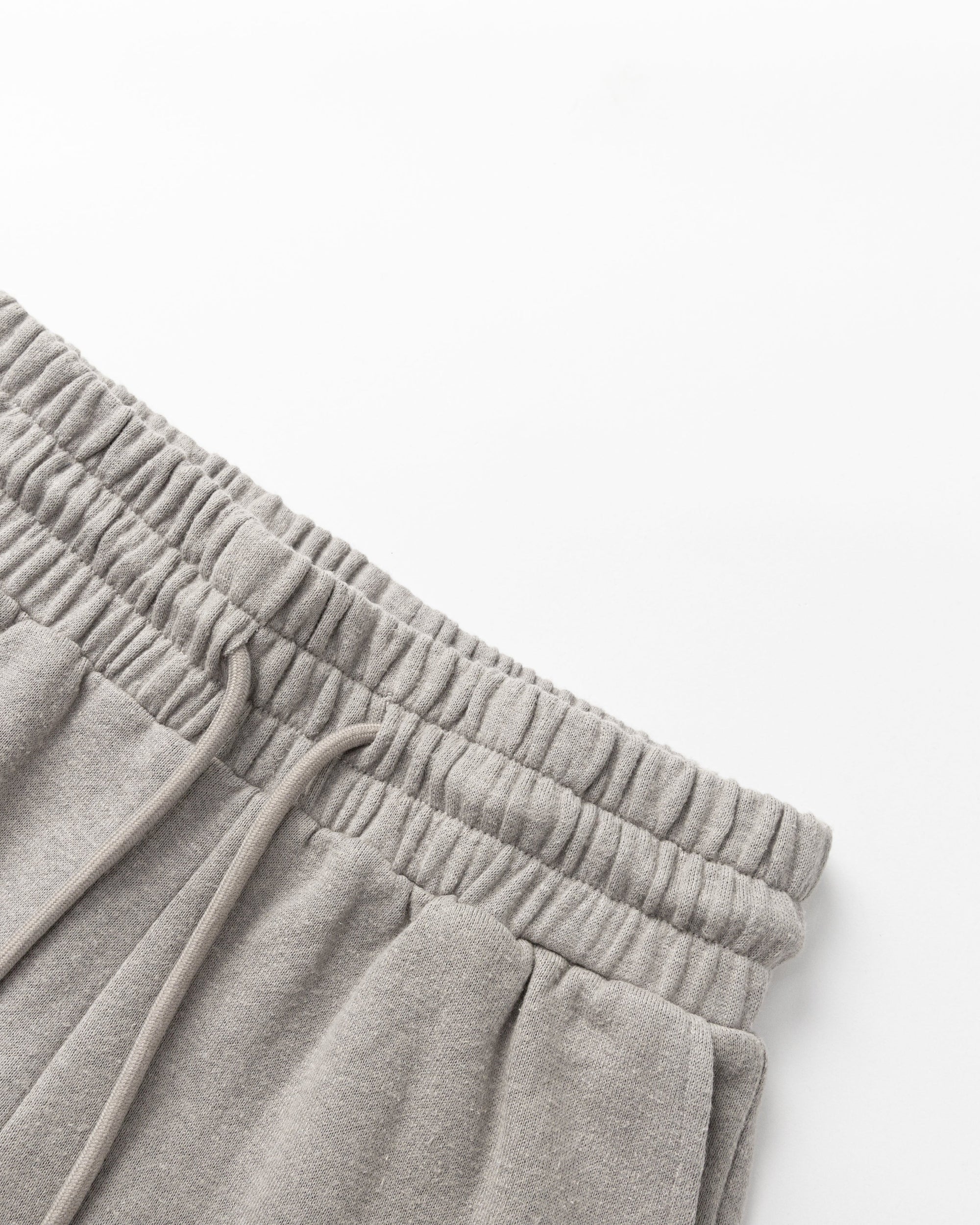 Detail shot of waistband and stitching on Fleece Shorts (gray).