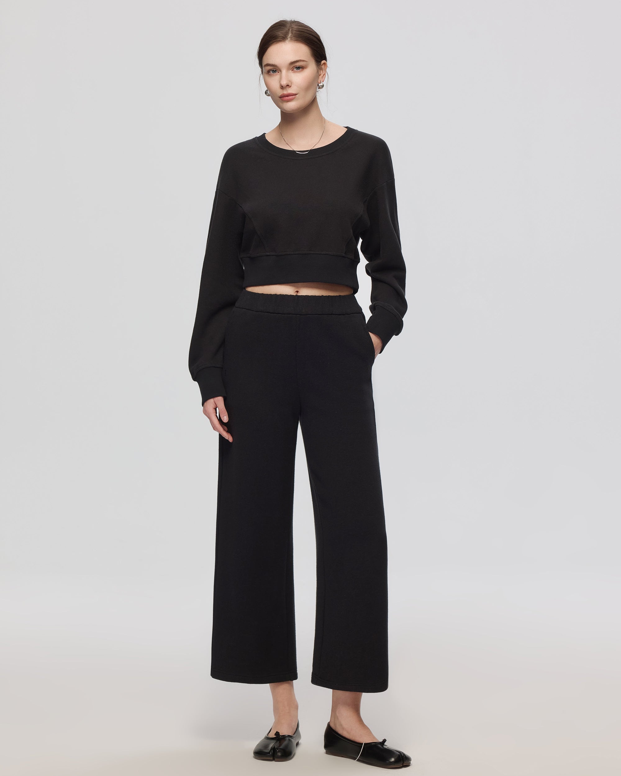 Full-body view of Fleece Cropped Sweater  and Hemp Essentials Fleece Sweatpants (black) 7/8 length, styled head-to-toe.
