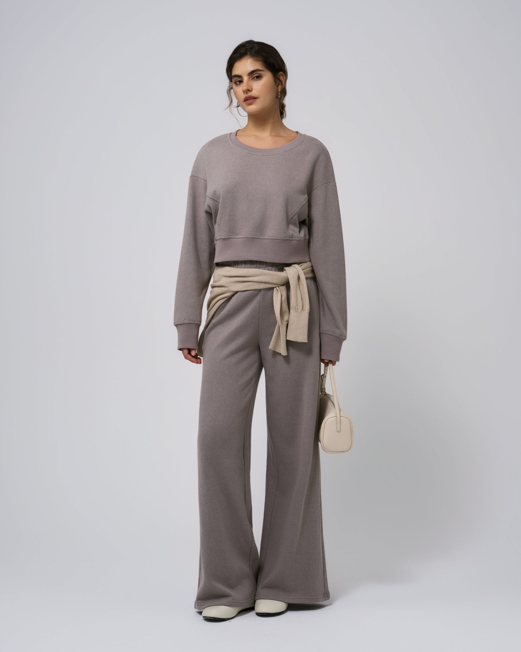 Model wearing gray Hemp Essentials Fleece Sweatpants (hemp–organic cotton); straight‑on front.