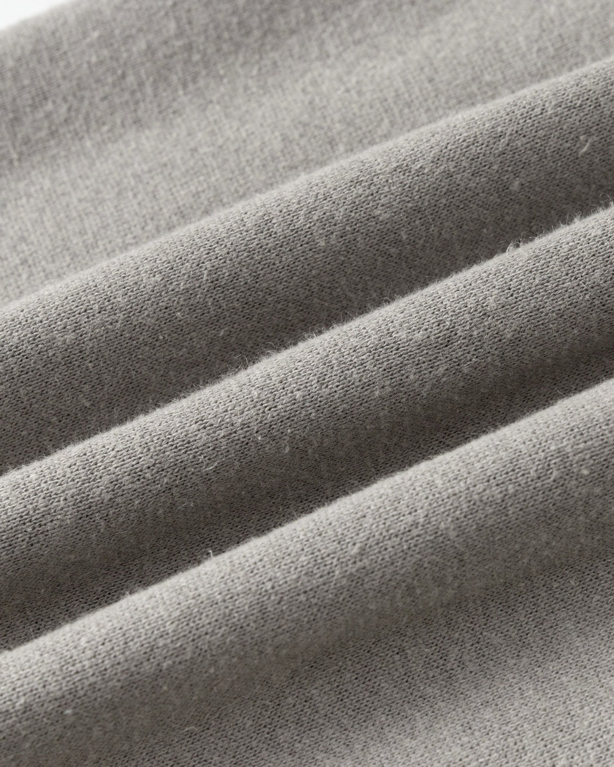 Close-up of hemp–organic cotton fleece knit of Sweatpants (gray).