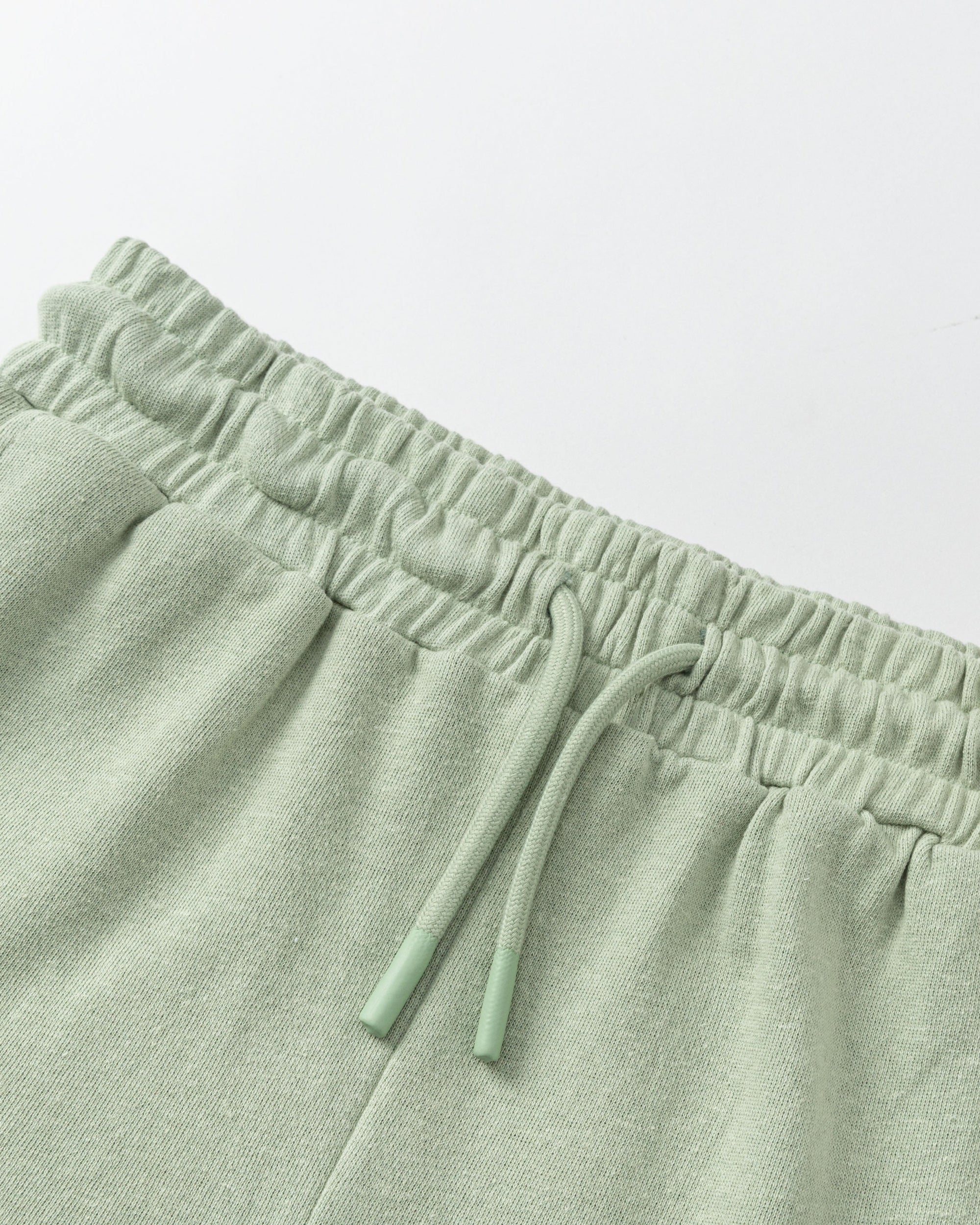 Juana Hemp Essentials French Terry Shorts light sage (sustainable hemp–organic cotton) showing waistband finish and French terry texture detail