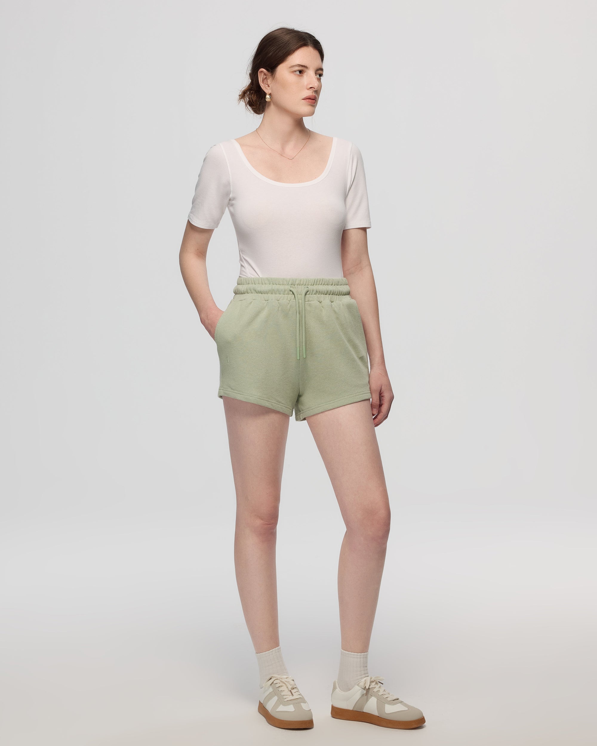 Juana Hemp Essentials French Terry Shorts light sage (sustainable hemp–organic cotton) worn on model with relaxed fit and easy drape
