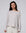 Model wearing Juana Hemp Essentials Off The Shoulder Top in ash (hemp–organic cotton blend), showing off-shoulder neckline and clean silhouette.