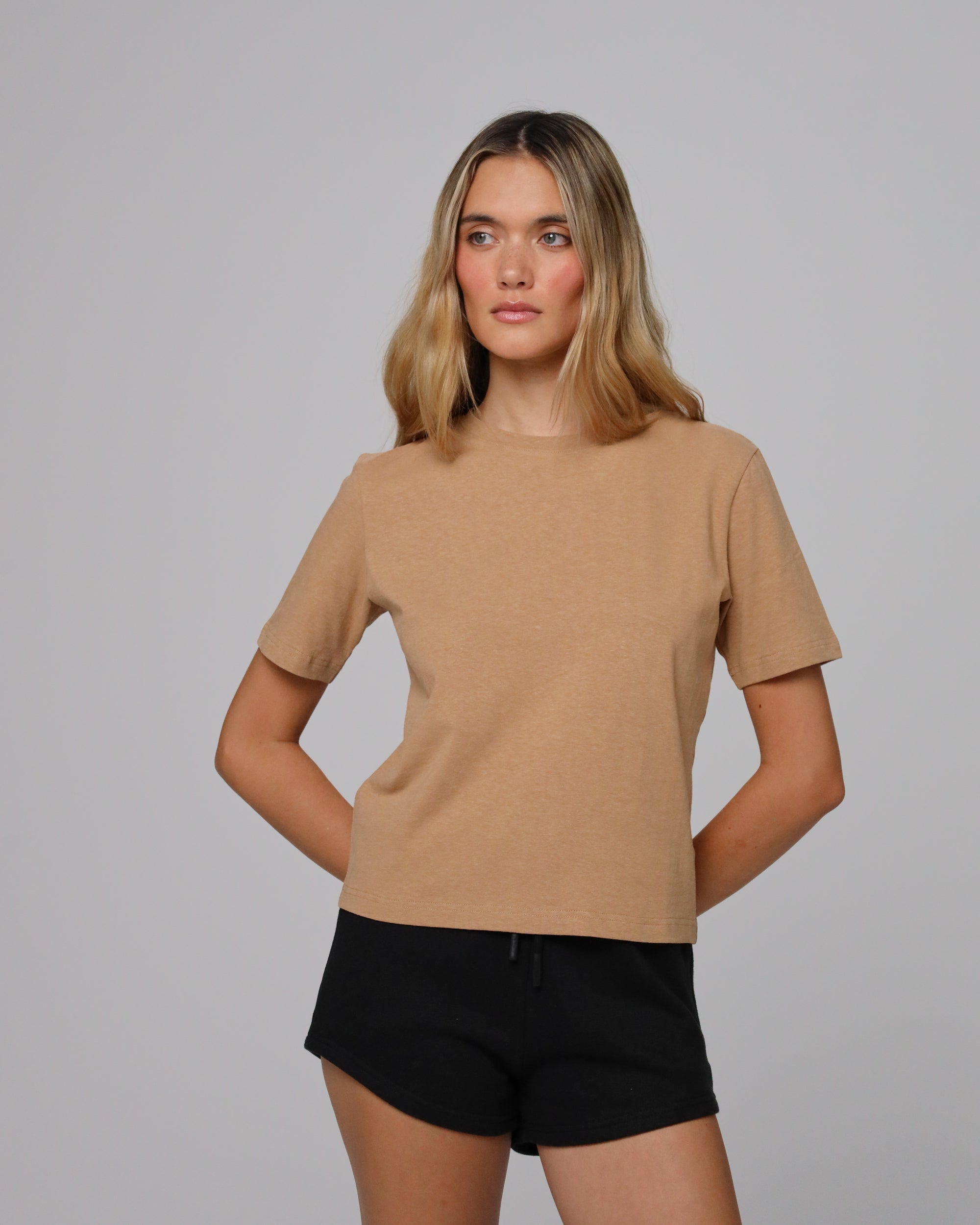 Detail shot of crew neckline and seam finishing on Short Sleeve Tee (fawn).