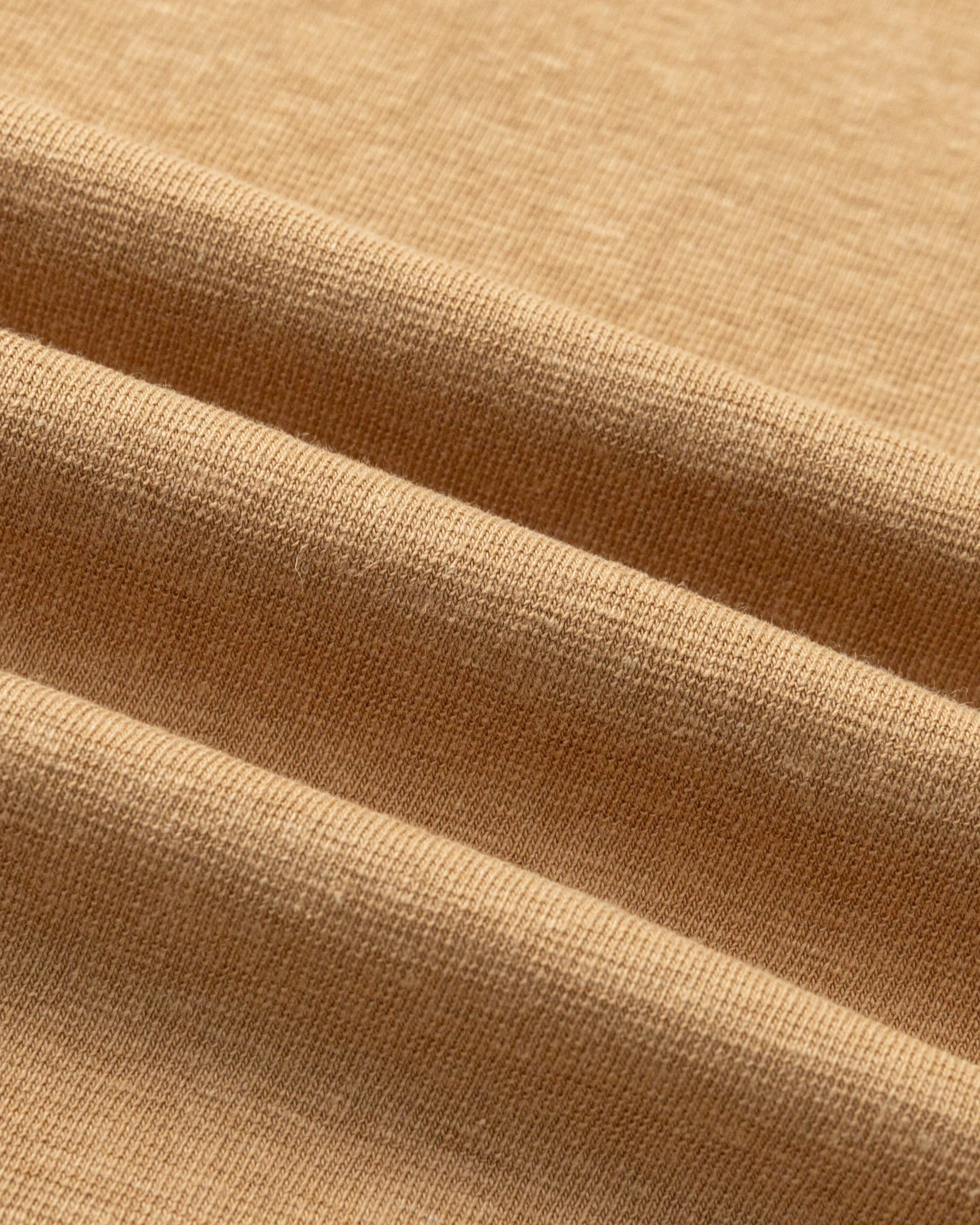 Close-up of hemp–organic cotton stretch knit of Short Sleeve Tee (fawn), highlighting breathable texture.
