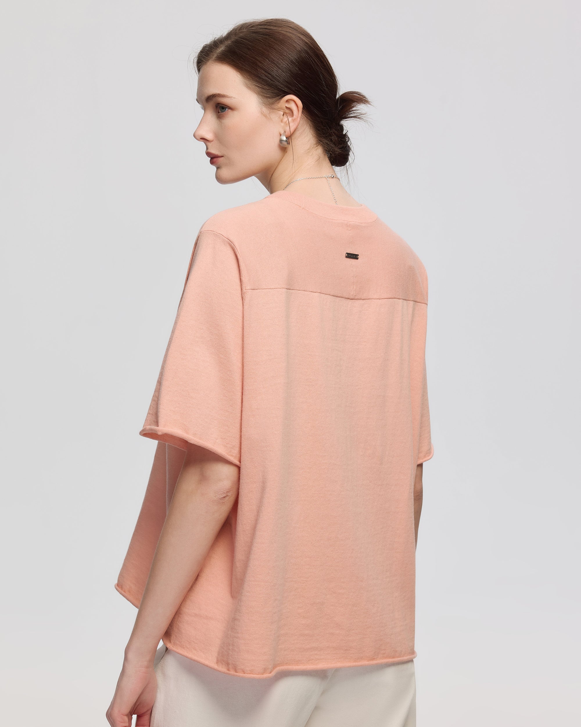 Juana Hemp Essentials Sweater Knit Tee peach (sustainable cotton–hemp) back view on model highlighting bias-knit back yoke detail